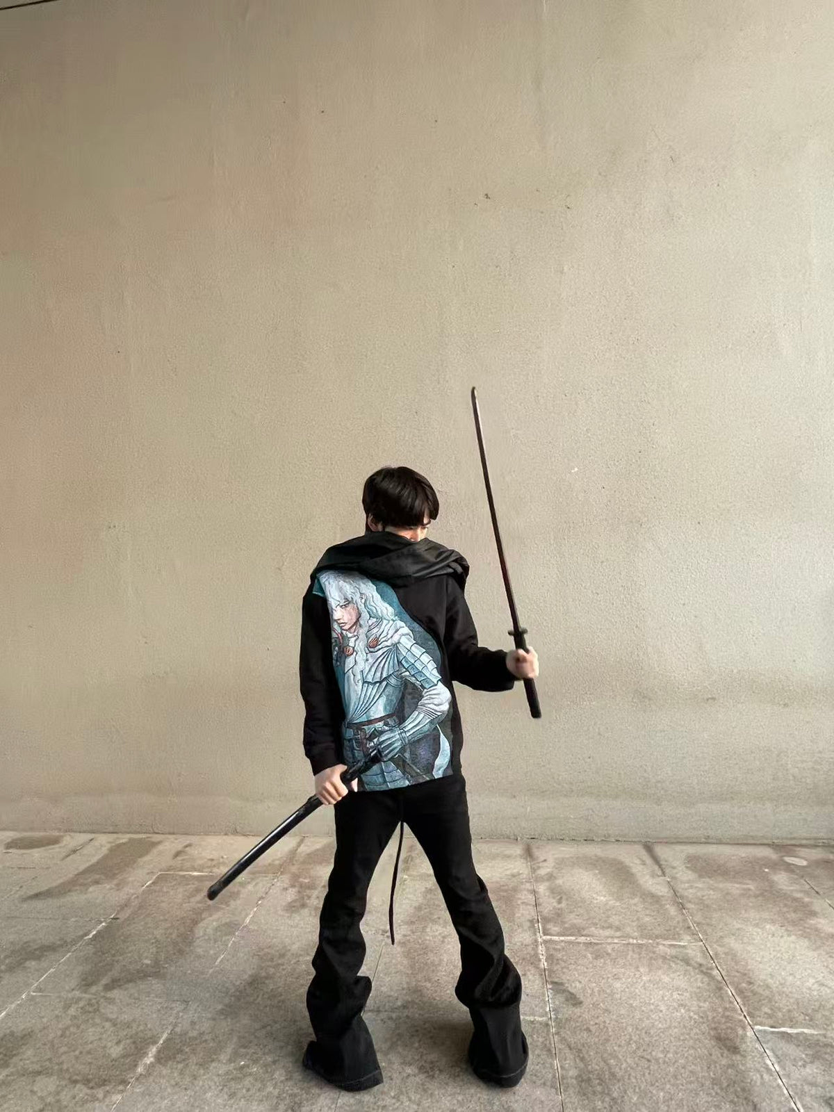 Model wearing Masque Studio black oversized sweatshirt
